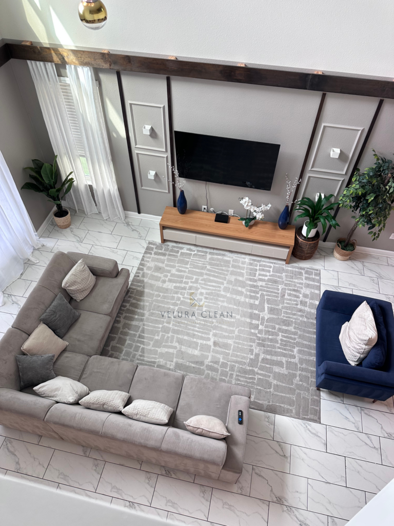 Velura Clean vacation rental cleaning team preparing an Airbnb in Ocoee, FL – fresh linens, sanitized bathroom, and guest-ready kitchen for 5-star reviews
